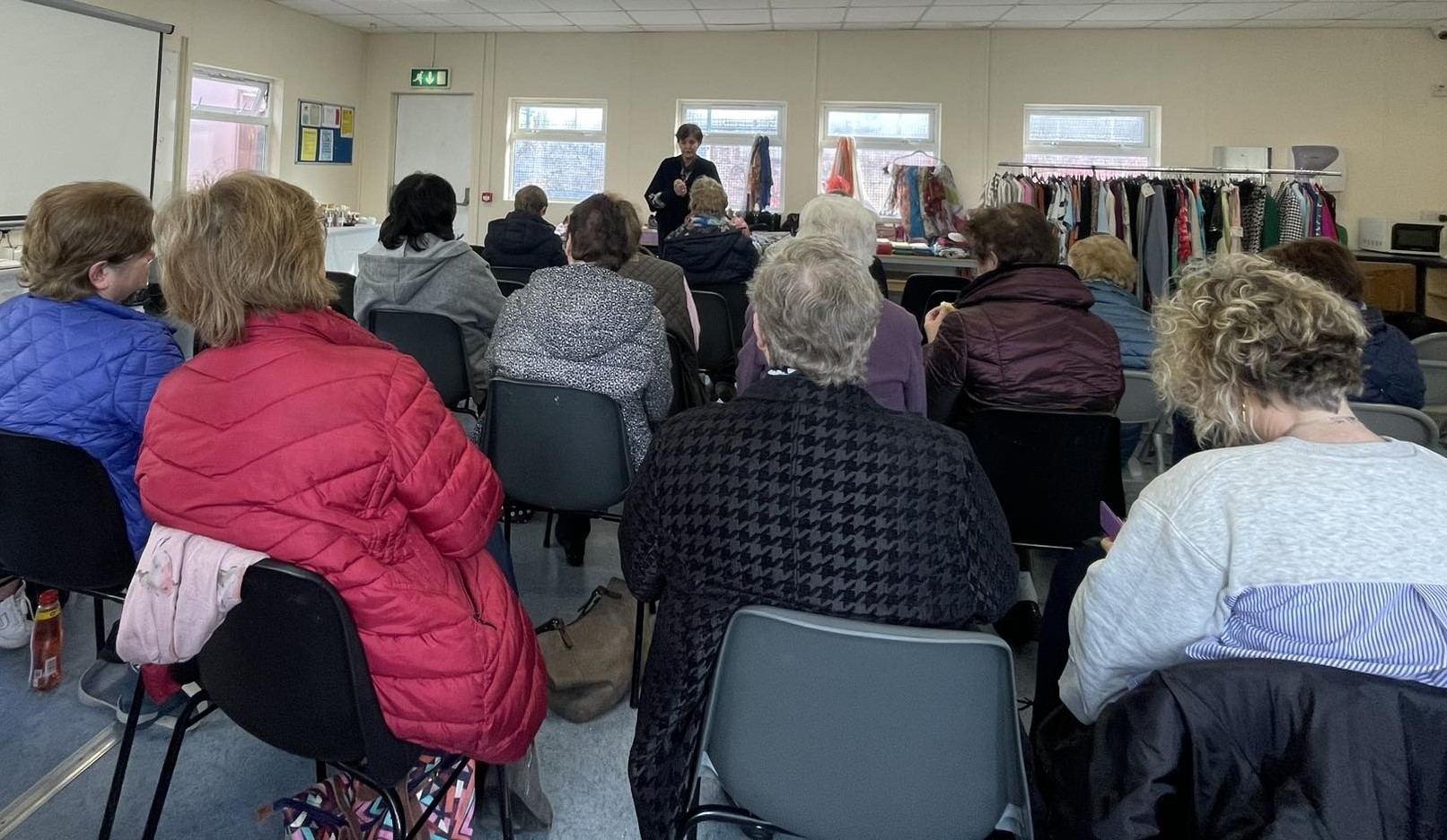 Large group of women attending event for International Women's Day